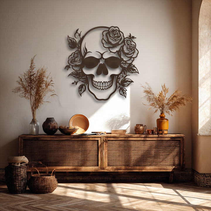 The brightest area, a sunlit section of the wall, highlights the intricate floral skull metal art for wall, showcasing its gothic rose decor.