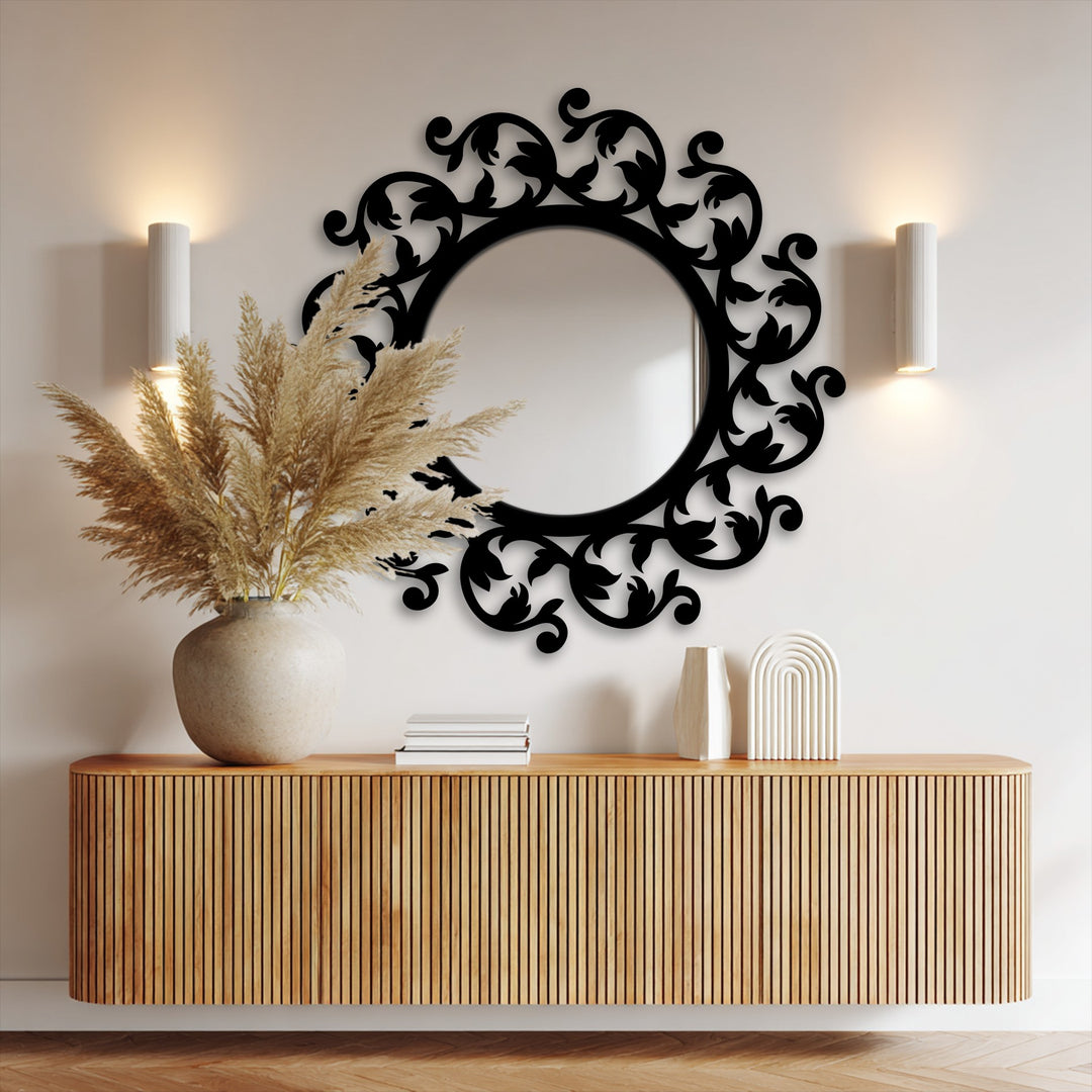 Circular mirror with scrolling leaf frame