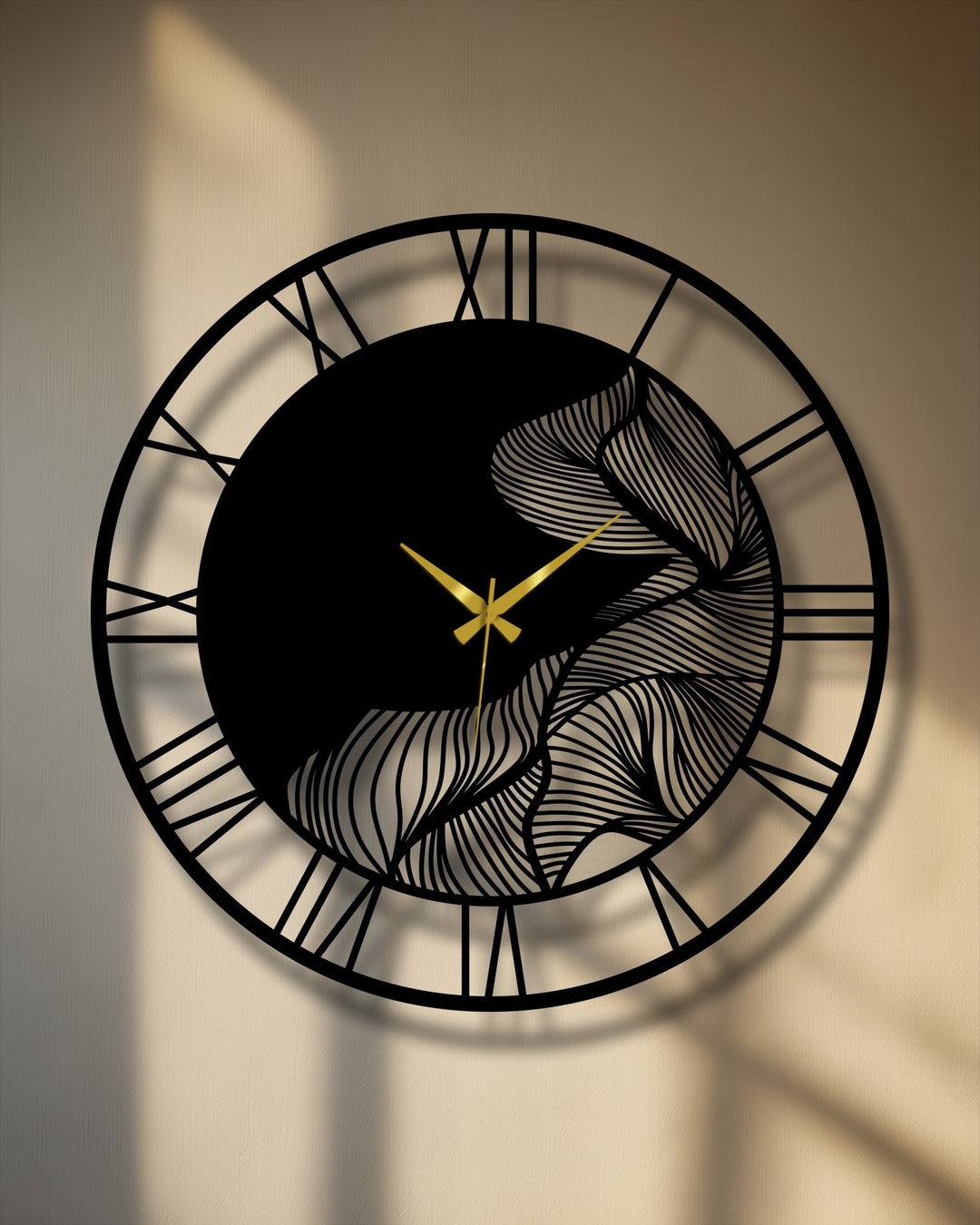 Negative space highlights the leaf design of this metal wall clock, creating a unique modern wall decor piece featuring abstract botanical elements and Roman numerals.