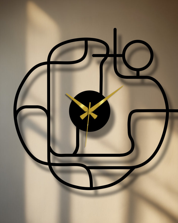 Highlighting the abstract quality, this contemporary metal wall clock showcases a continuous line design, adding an artistic touch to modern metal wall decor.