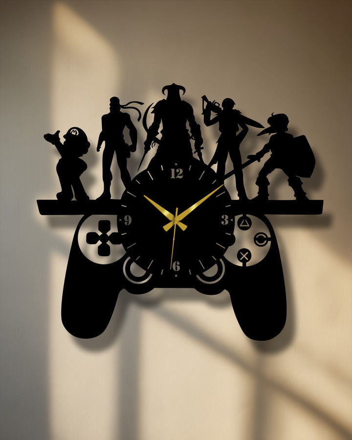 A gaming controller-shaped clock showcases unique metal wall art as silhouetted video game icons like Mario, Link, and the Dragonborn stand atop, blending decor and function.