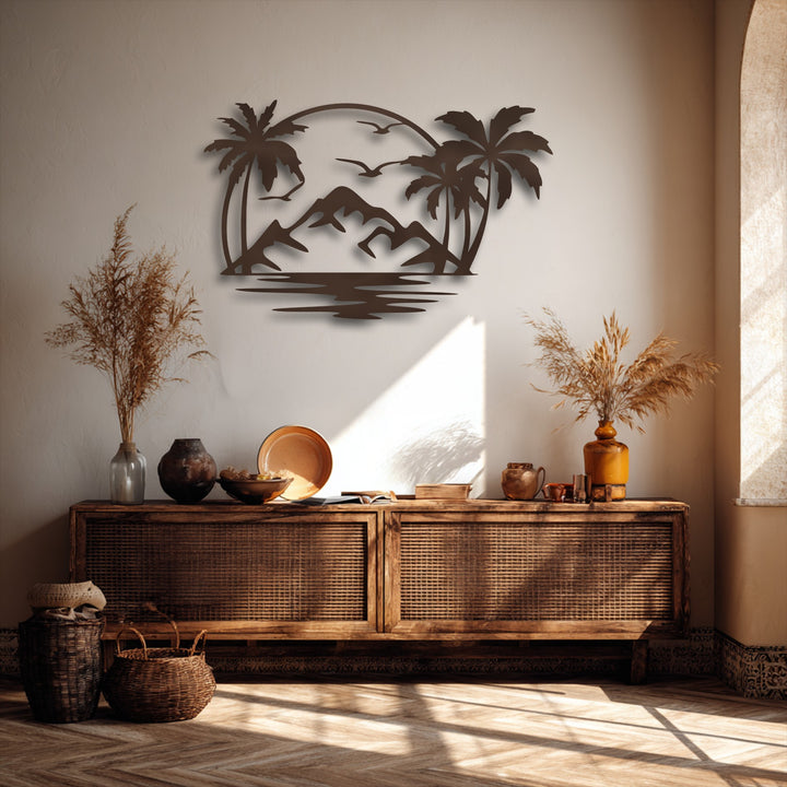 The textured light beige background showcases captivating metal wall decor depicting a tropical sunset island paradise with palm trees and mountains.