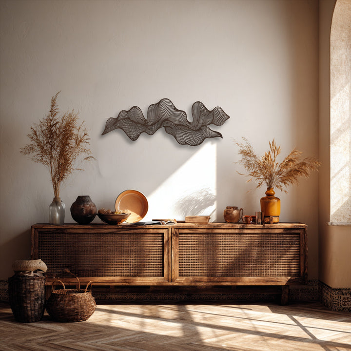 The focal point is a striking abstract wave flow decorative metal art piece, featuring intricate interlocking dark metal lines.