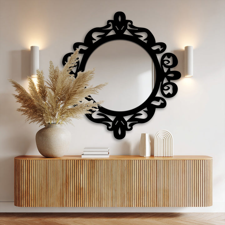 The focal point is a striking ornate royal crest round black metal artwork, beautifully reflecting light above a console.