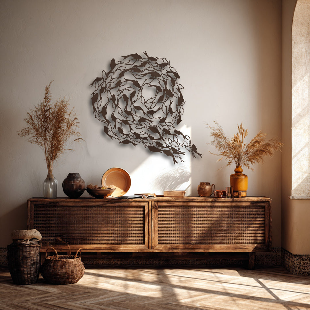 The flowing geometric shapes of numerous koi fish form a dynamic circular pattern in this decorative metal art piece.