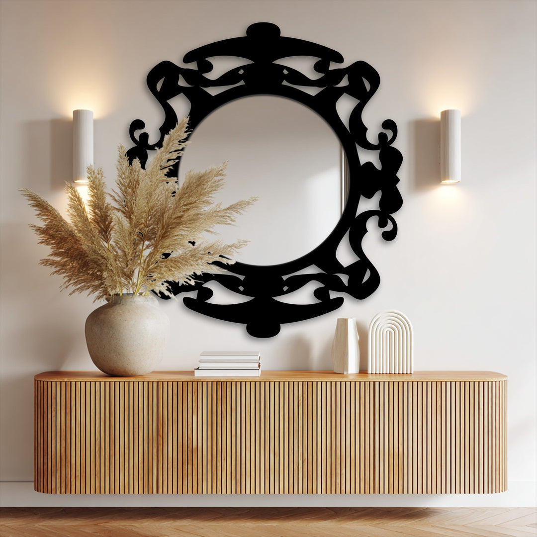 Geometric black frame accentuates the round mirror's sleek design, creating a unique metal wall art focal point with symmetrical curves.