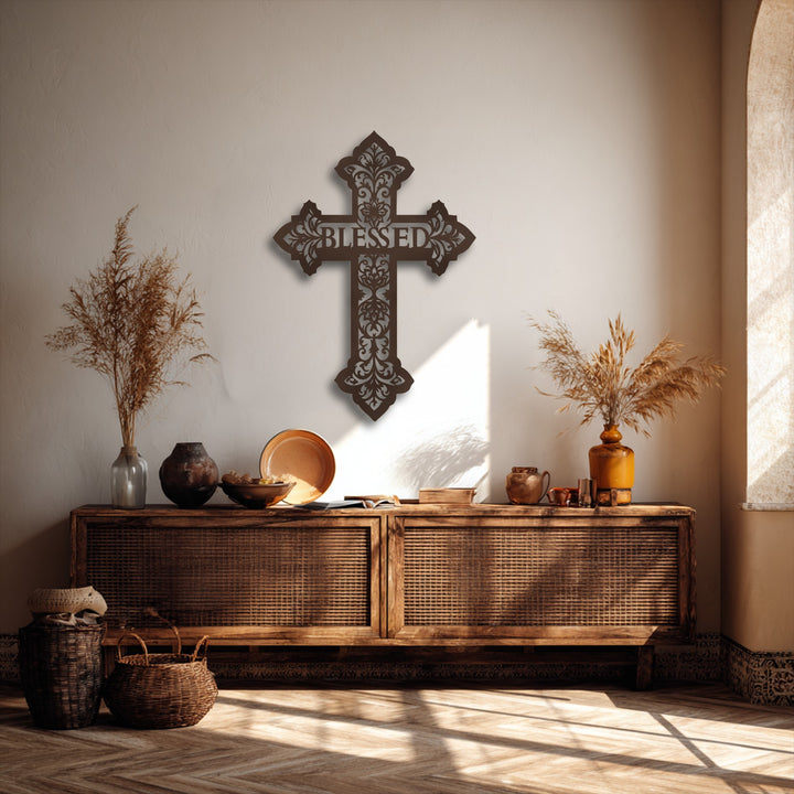 A dimensional Blessed Cross metal wall decor stands out from the textured wall, casting intricate shadows that add significant depth.