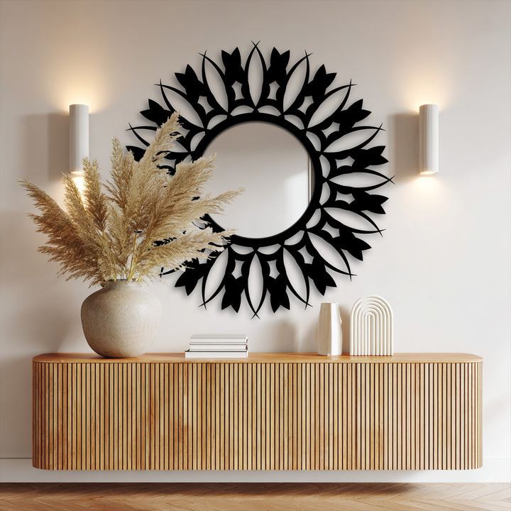 Featuring a sleek black finish, the floral sunburst floor mirror adds a modern touch with its intricate metal wall decor frame.