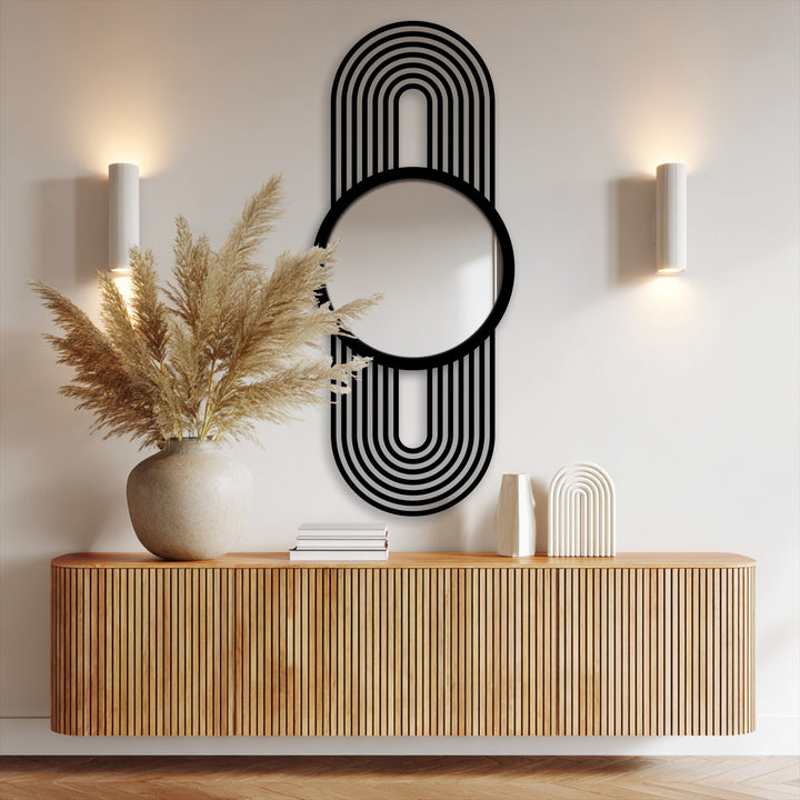 Light and shadow interplay on the modern arch line floor mirror, accentuating its black frame and the sleek design of this decorative metal art piece.