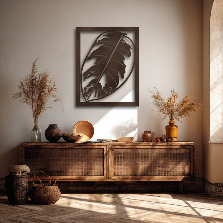 Woven baskets and a cane cabinet on a herringbone floor highlight the stylish tropical monstera leaf decorative metal art above.