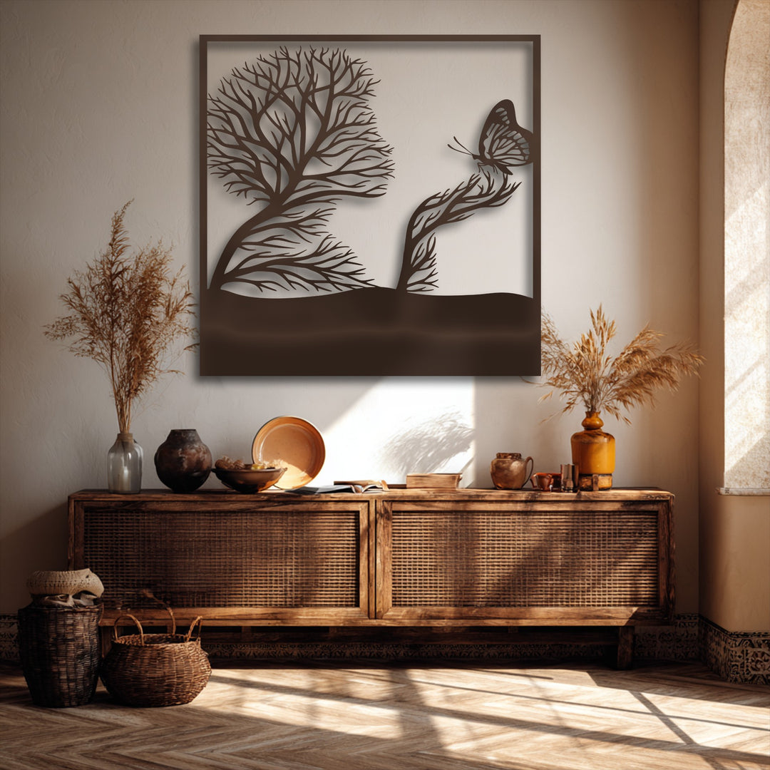 Organic forms beautifully capture a whimsical tree and butterfly scene in this decorative metal art piece, enhancing the room's artistic nature.