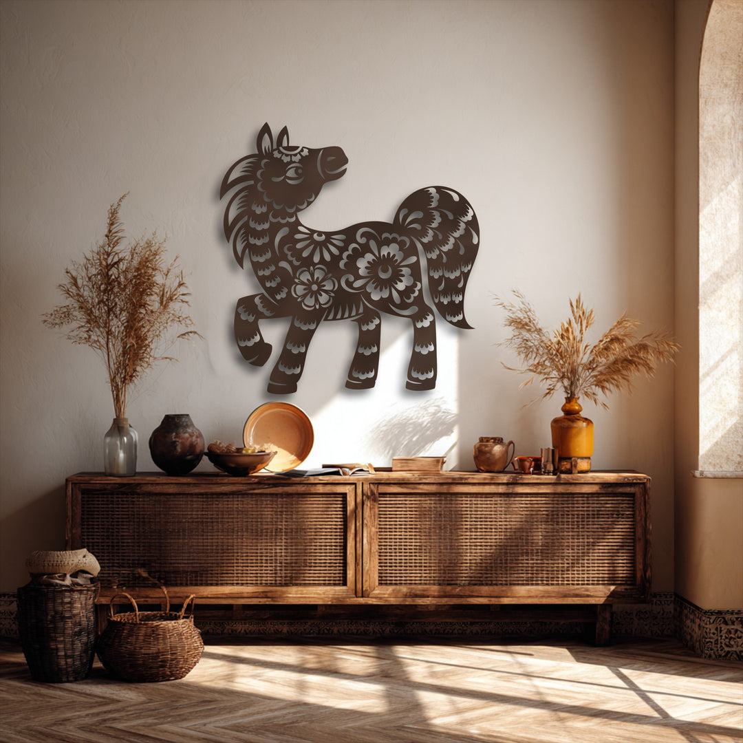 The stark color contrast of the dark brown floral pony metal wall decor against the warm off-white wall creates a captivating visual.