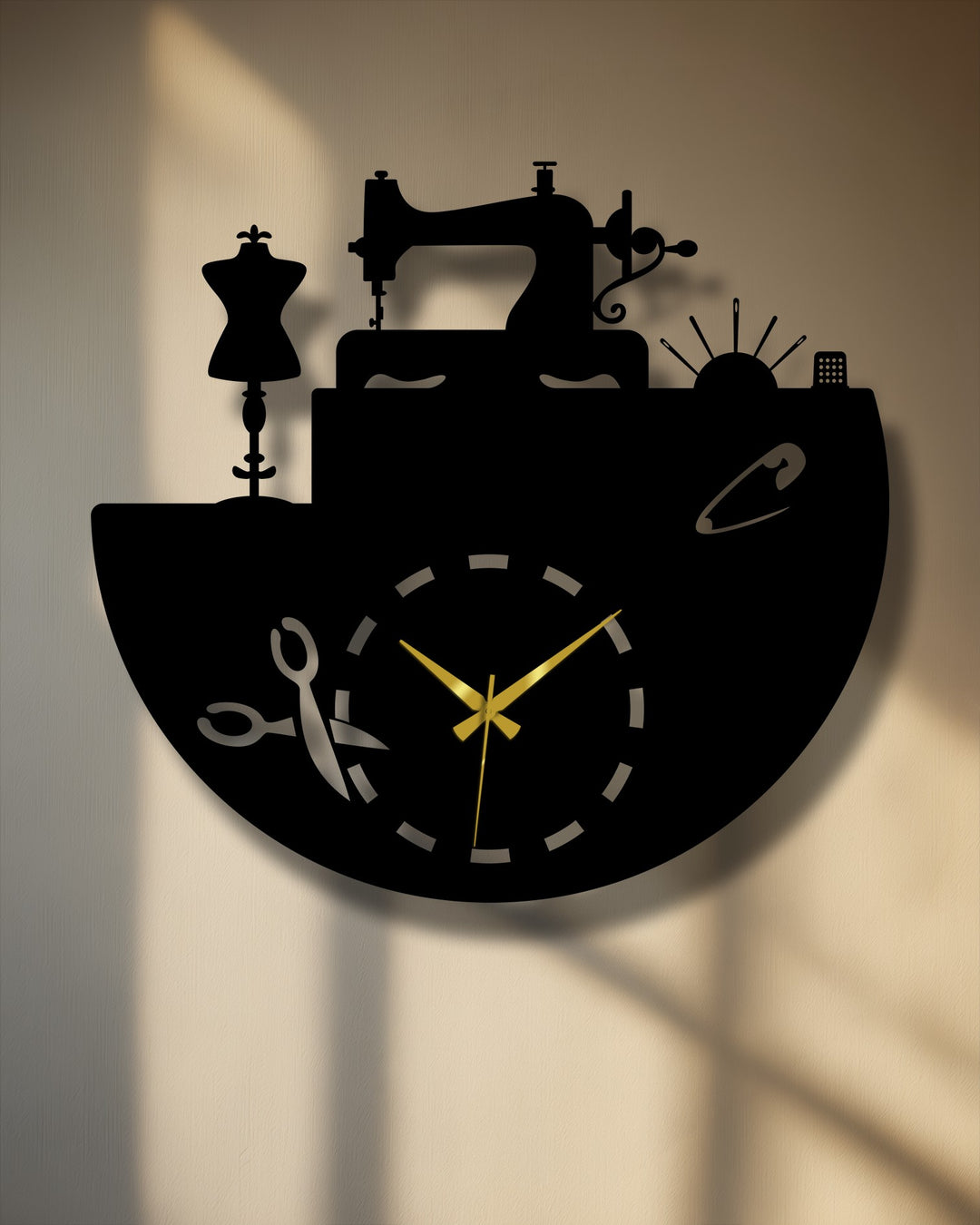 The visual rhythm of overlapping silhouettes of sewing tools like the mannequin, sewing machine, and pins forms this striking metal wall decor clock.