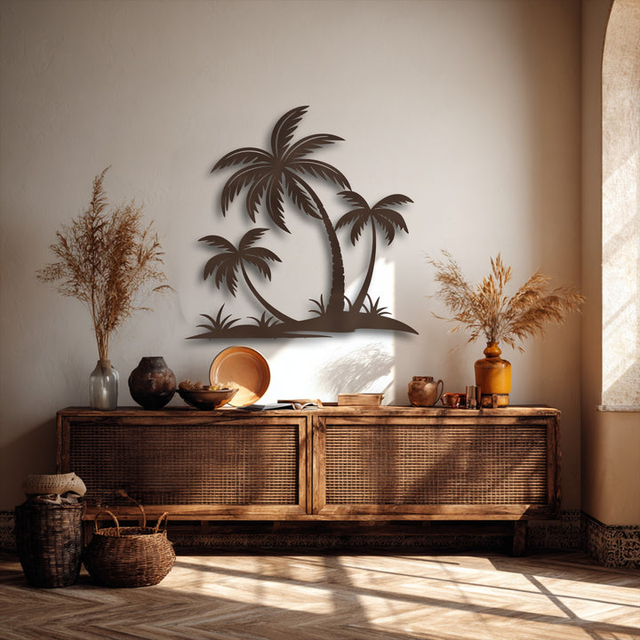 A dimensional unique metal wall art piece of tropical palm tree silhouettes, layered with overlapping elements and shadows against a textured wall.