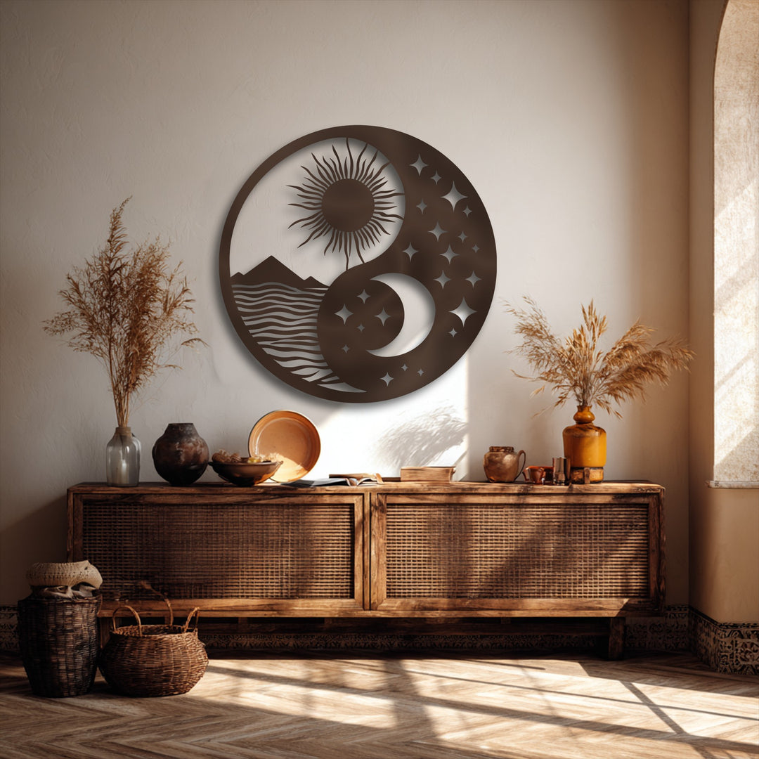 Vivid color contrast highlights the dark bronze Yin Yang sun moon landscape metal wall decor against a bright, warm beige wall.