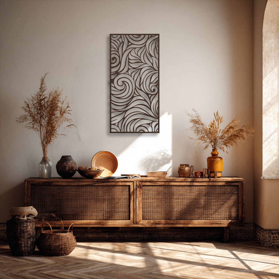 Flowing abstract swirl metal artwork creating dynamic movement on a textured wall, illuminated by sunbeams.