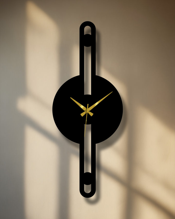 The sleek black finish on this minimalist metal wall clock complements its vertical line design, offering a striking piece of metal wall decor for contemporary spaces.
