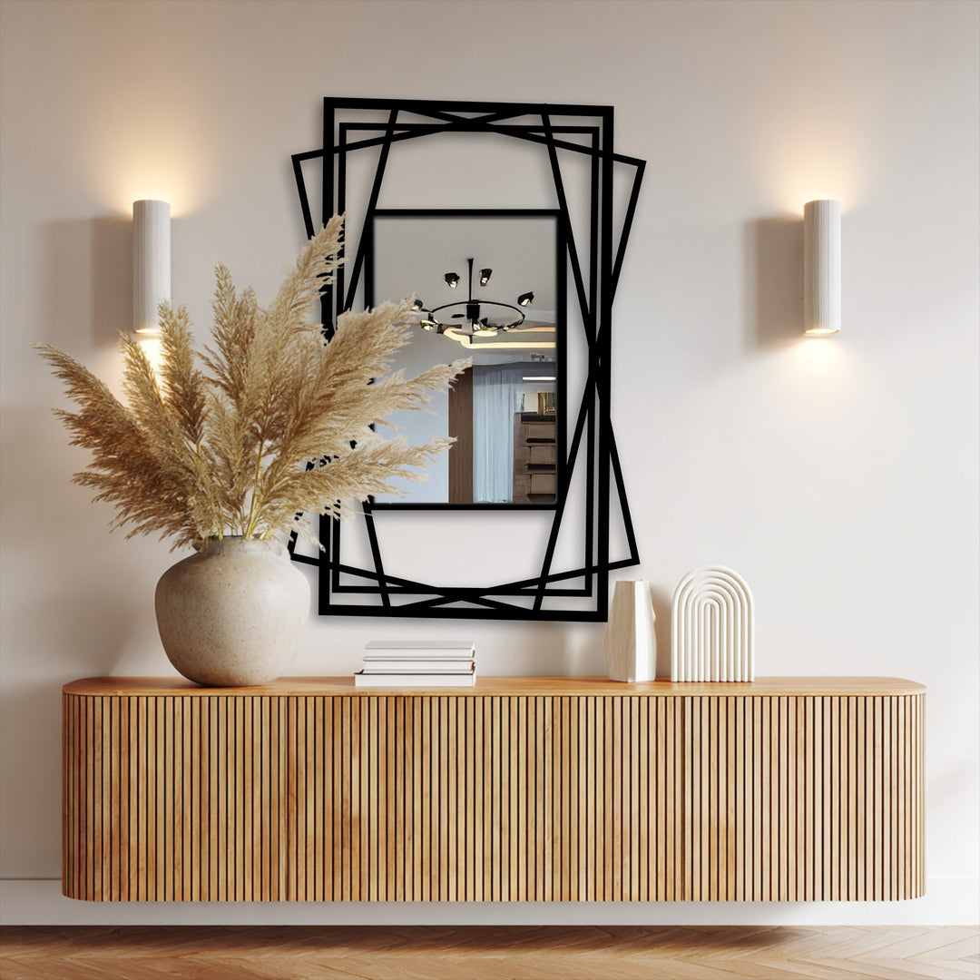 Black finish accents the layered geometric mirror for wall decor, complementing its modern metal design and creating a bold statement.