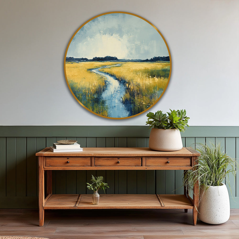 Circular golden horizon, serene meadow river oil painting art piece showcases a peaceful landscape with a winding river flowing through a golden field.