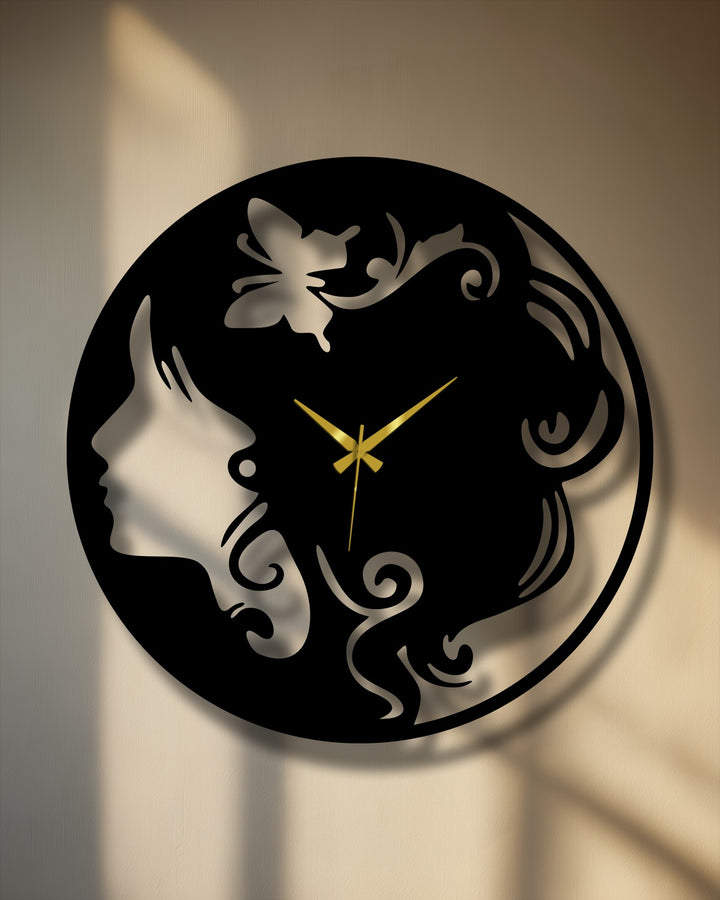 A tranquil mood emanates from this unique metal wall art, featuring an elegant woman silhouette clock with a butterfly, softly lit.