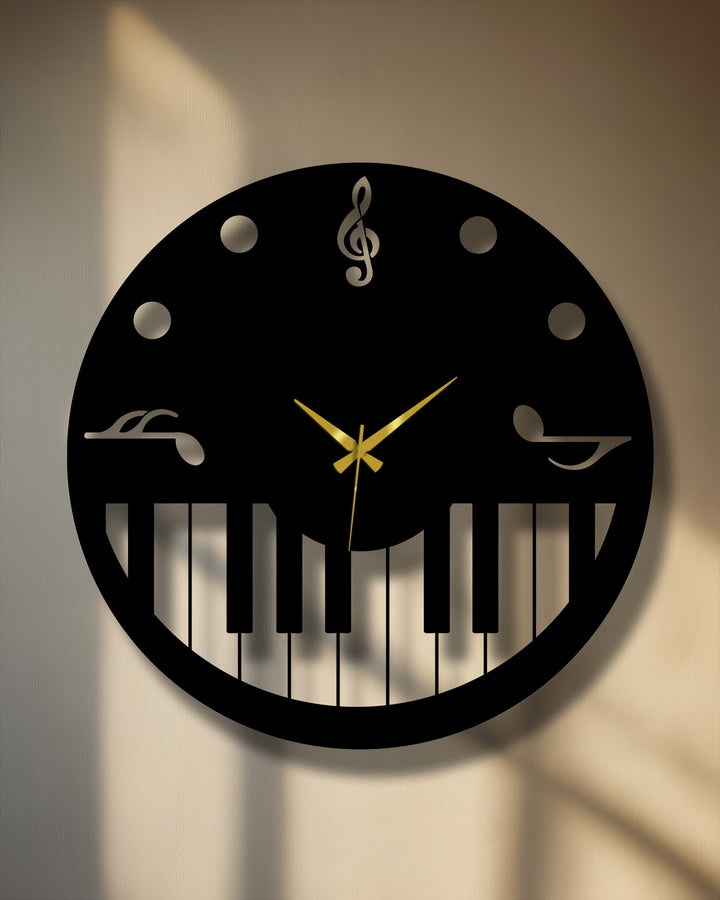 The black music theme metal wall clock, featuring gold hands and a piano key design, is a striking piece of decoration wall art.