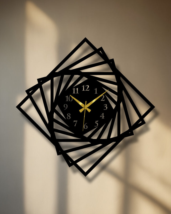 The wall's color transitions from bright beige to warm, shadowed brown, providing depth for the black spiral unique metal wall art clock.
