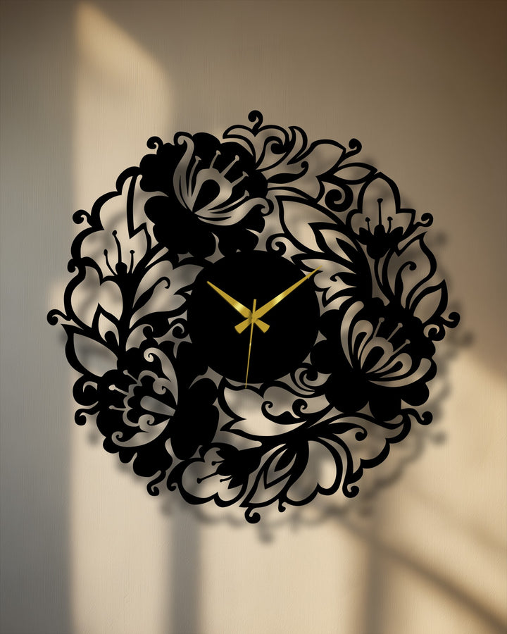 Blooming garden's organic forms intertwine in this decorative metal art clock, an elegant floral design for a nature-inspired timepiece.