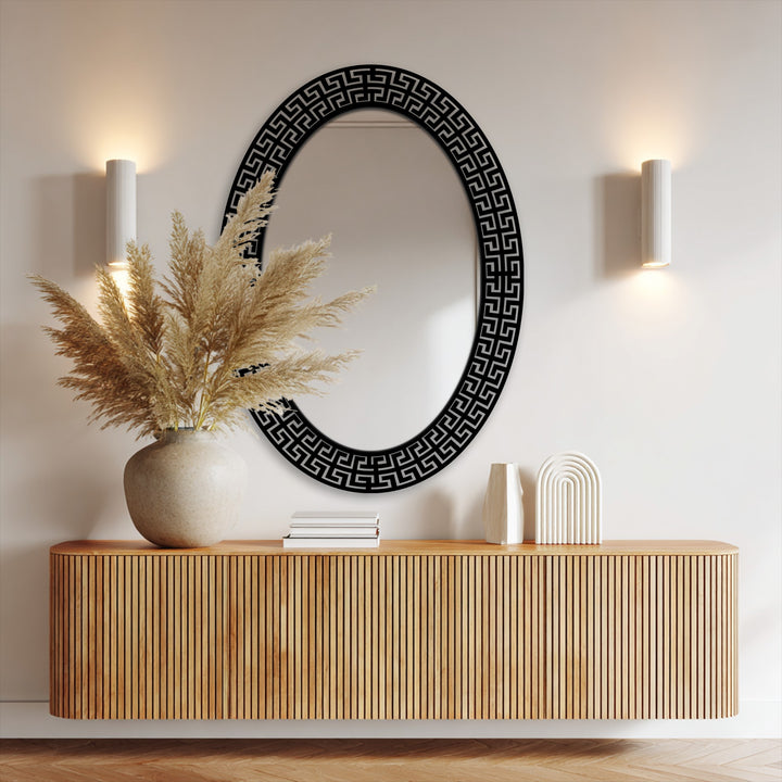 Oval mirror with a striking Neo Greco Greek key metal frame is the focal point, perfect for decorating with wall mirrors.