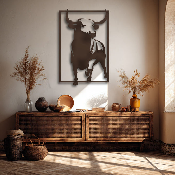 Focusing on the organic forms, this striking bull unique metal wall art captures the powerful stance of a charging animal, complemented by natural dried botanicals.