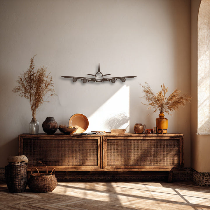 The central subject is an Airplane Front View metal art for wall, showcasing intricate aviation decor above a rustic wooden cabinet.