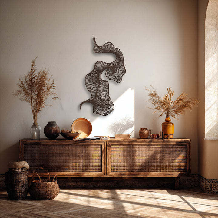 Delicate plumes of dried pampas grass complement the sleek abstract flowing lines of the modern metal art for wall, enhancing a serene, minimalist decor.