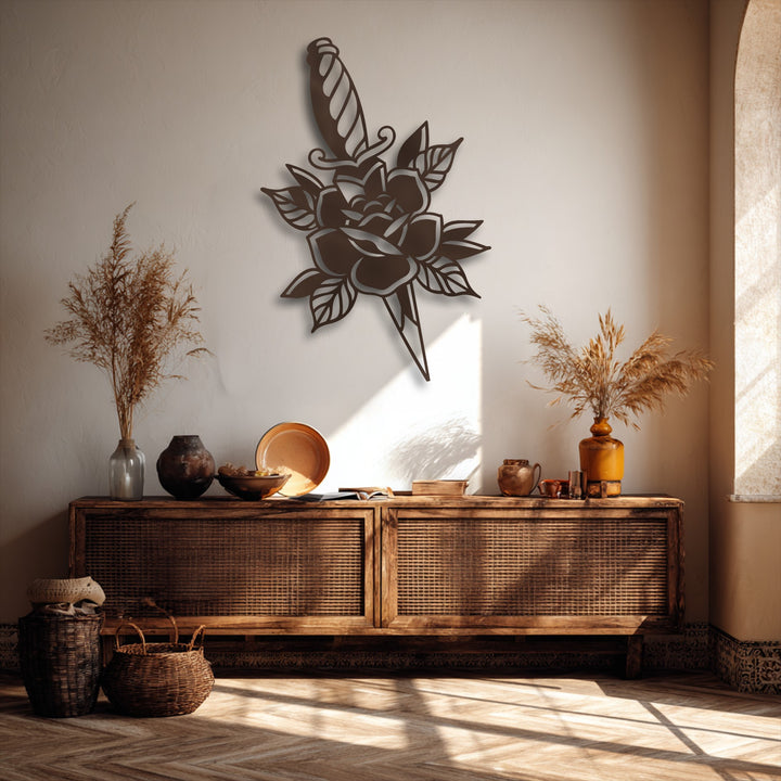 The darkest area, a striking deep brown, forms the rose and dagger metal decoration wall art silhouette.