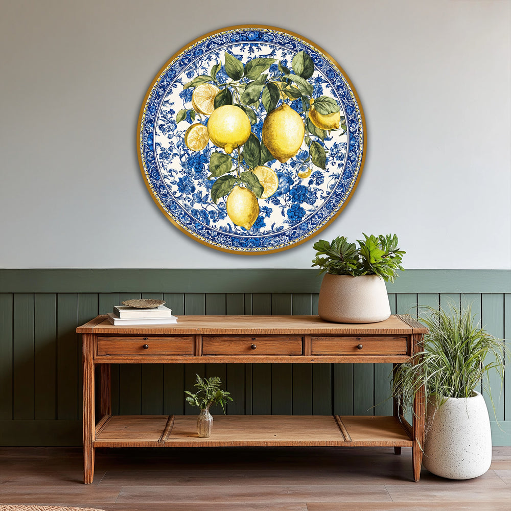 Dominated by a circular frame, the Mediterranean Freshness round oil painting artwork features lemon and floral motifs within concentric bands of geometric blue patterns.