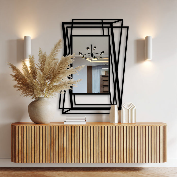 The darkest area shows the bold overlapping metal lines that frame a reflective surface in this multi-layer abstract geometric frame floor metal art for wall.