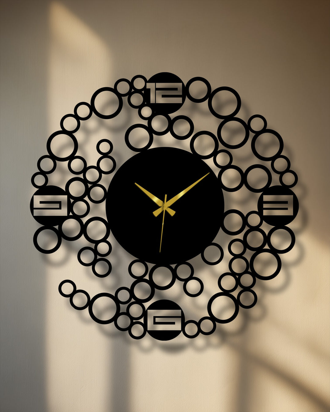 Warm sunlight casts a glow on this modern bubble ring metal wall clock, enhancing its decoration wall art appeal with minimalist geometric design.