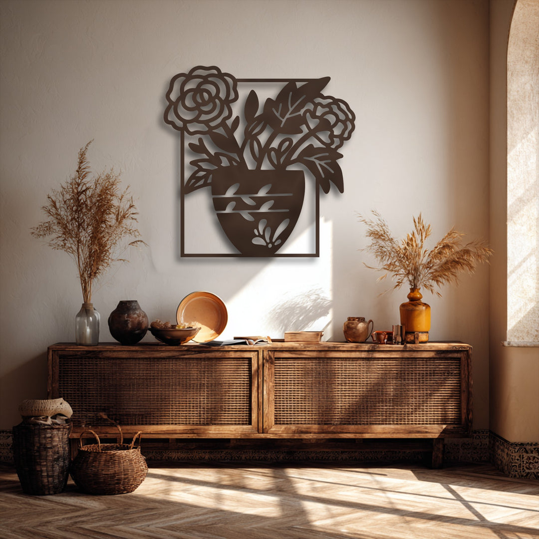 The organic forms of a blooming elegance floral vase silhouette create a unique metal wall art piece, casting intricate shadows.
