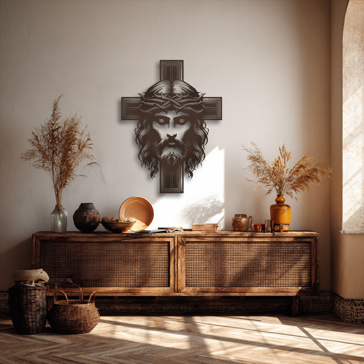 Revealing striking depth and layered elements, a unique metal wall art of Sacred Cross with Christ adorns a textured wall above a wooden console.