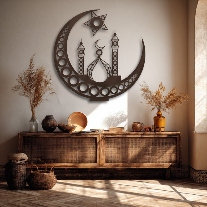 The warm color temperature highlights the intricate Islamic Crescent Moon Mosque metal art for wall above a rustic console table with dried floral decor.