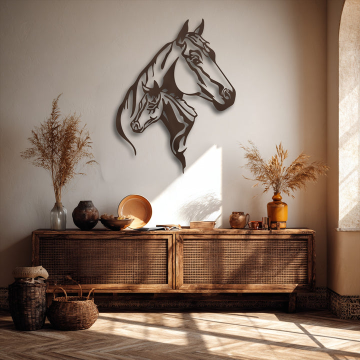Negative space artfully defines the dual horse head silhouette, an elegant animal metal wall decor piece, casting intricate shadows on the wall.