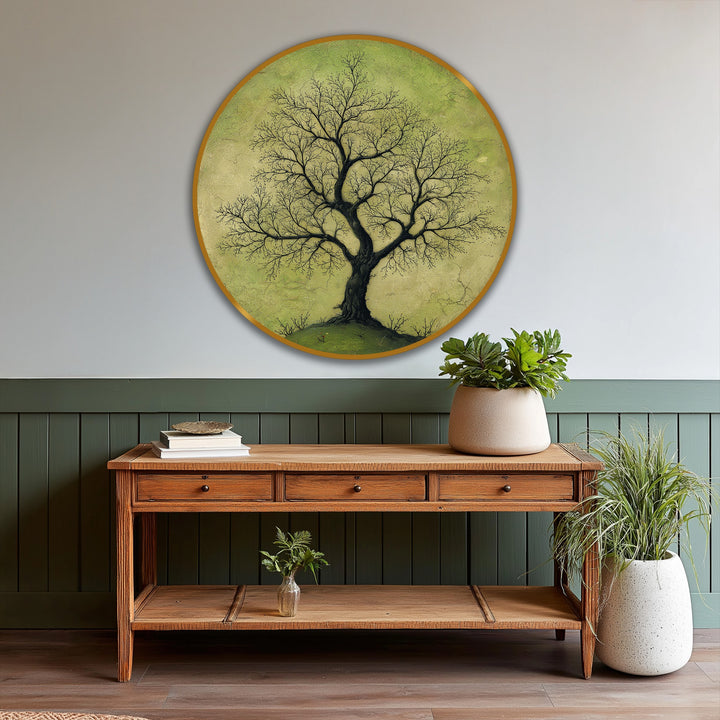 Circular orientation presenting a round oil painting art piece, a nature-inspired solitary branching tree in black against a soft green ground.