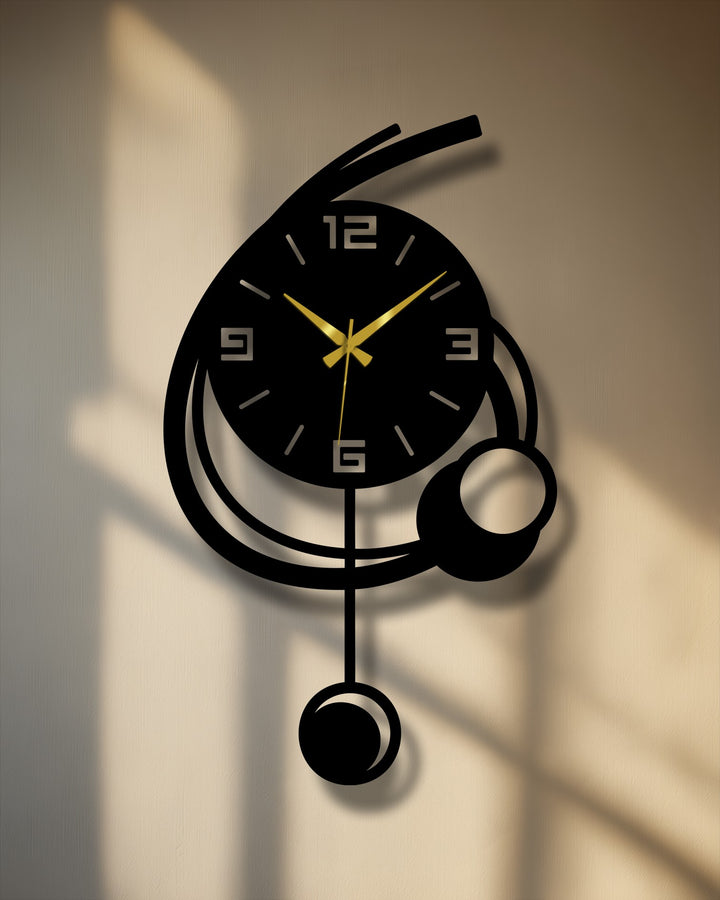 The curved lines and pendulum of this modern orbit metal wall clock evoke a dynamic sense of motion, enhanced by the sleek metal art for wall design.