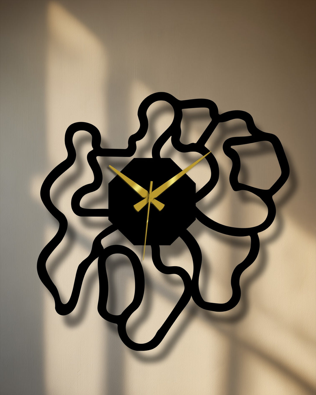 Dramatic light and shadow accentuate the modern abstract metal wall clock's organic shape, creating a striking decoration wall art piece.