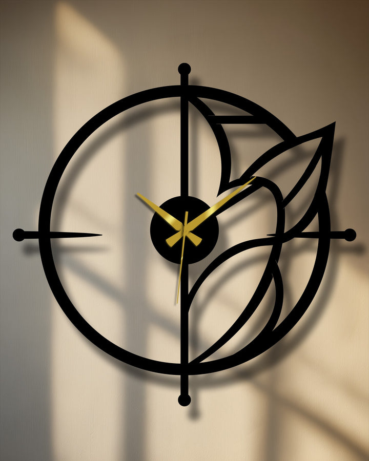 Showcasing the abstract quality of the metal wall clock, a unique metal wall art design uses circular and leaf elements for modern botanical charm.