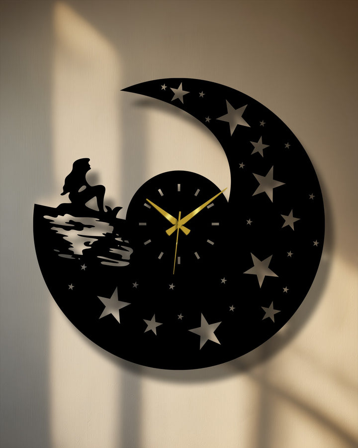 Color transition accentuates the celestial night design of this moonlight dream metal wall clock, a unique metal wall art piece for a modern home.