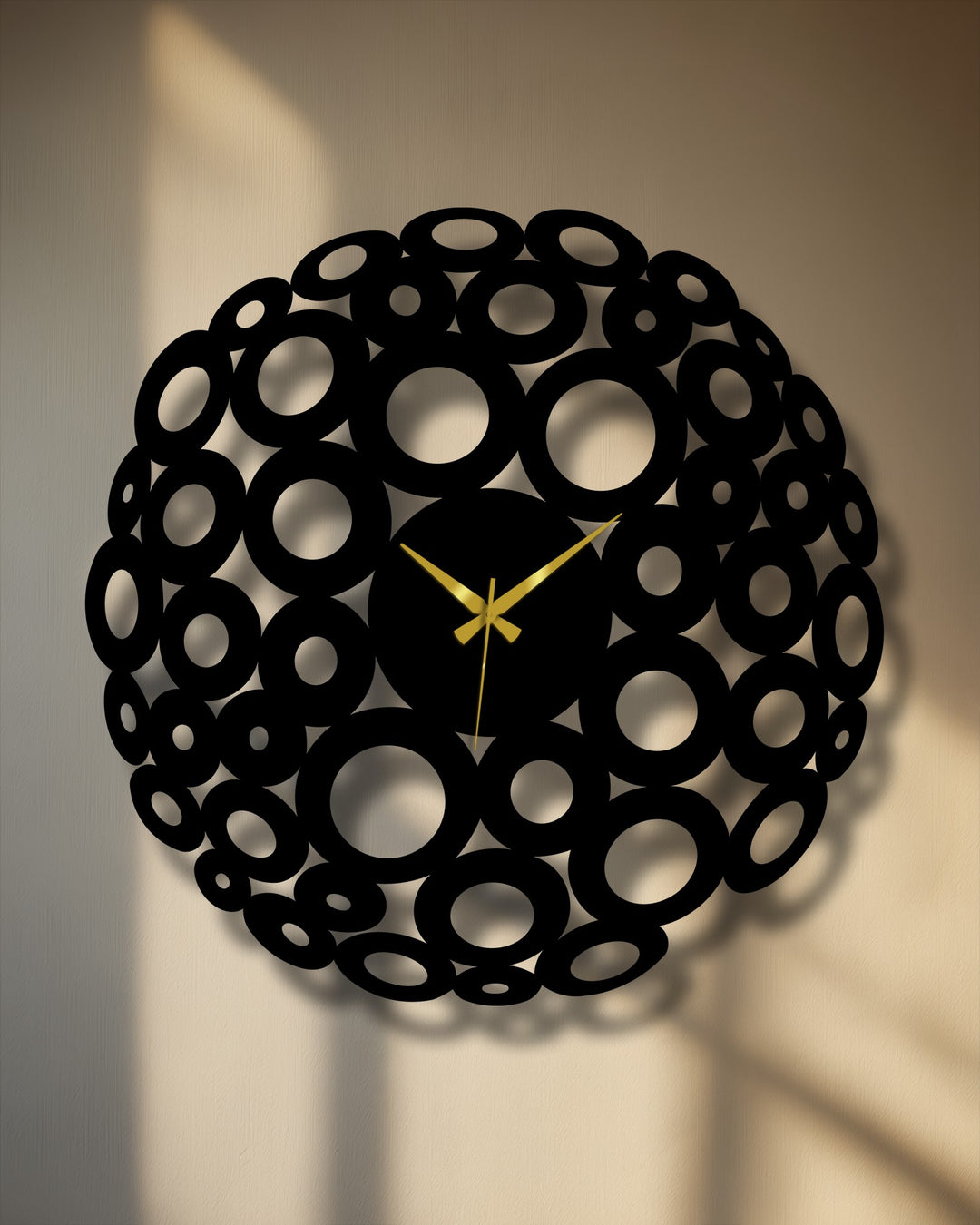 Warm color temperature accentuates the shadow lines in this decoration wall art, a modern metal wall clock featuring a bubble circle abstract design.