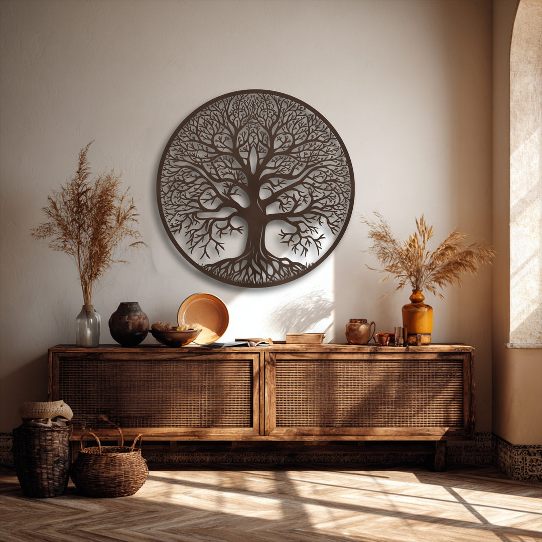 A textured beige wall serves as a serene backdrop for the detailed Tree of Life metal wall decor, illuminated by soft sunlight and distinct shadows.