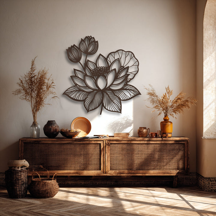 An abstract decorative metal art piece beautifully renders stylized lotus flowers and buds, creating a serene floral design.