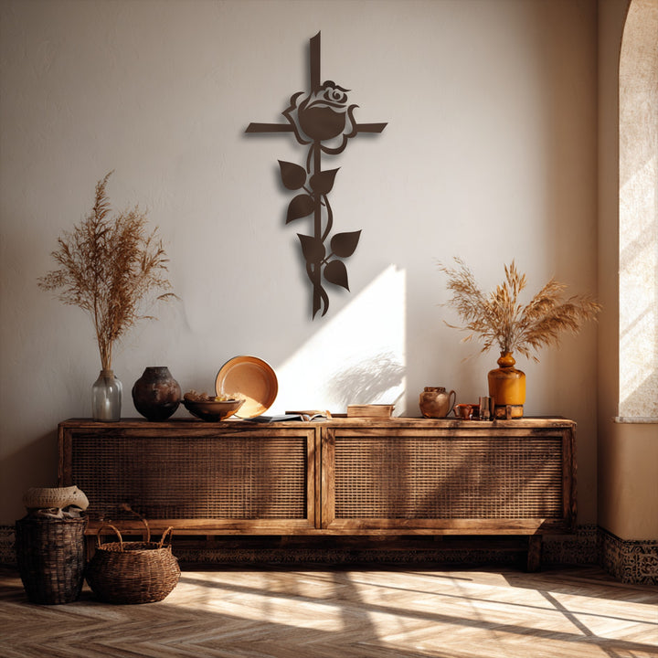 The foreground showcases two woven baskets on a sun-dappled herringbone floor, enhancing the unique metal wall art rose cross silhouette.