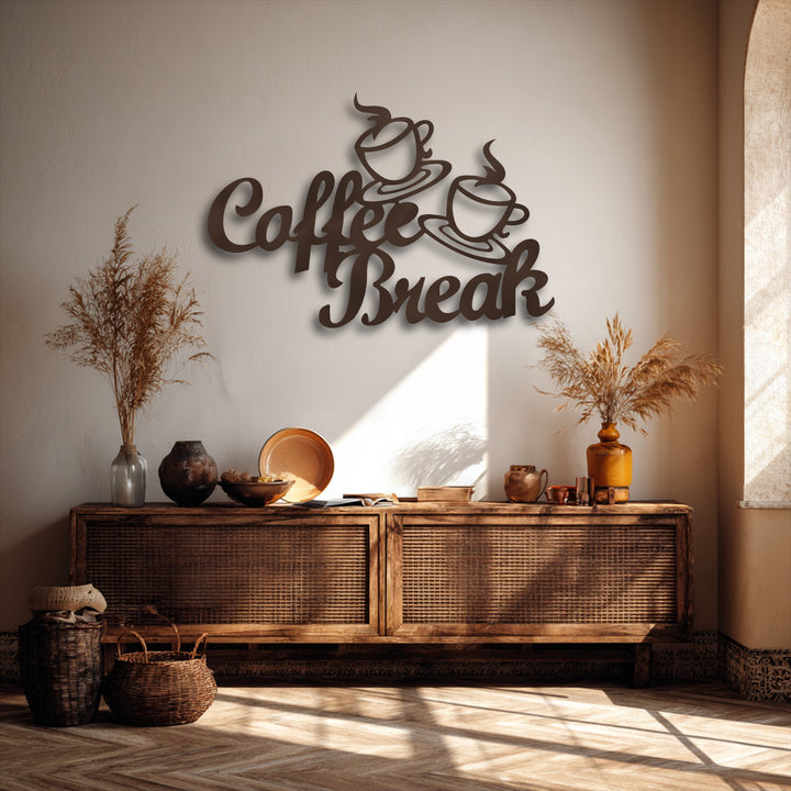 The focal point is a 'Coffee Break' decorative metal art in a dark finish, with elegant script and steaming cups, casting shadows on a textured wall.