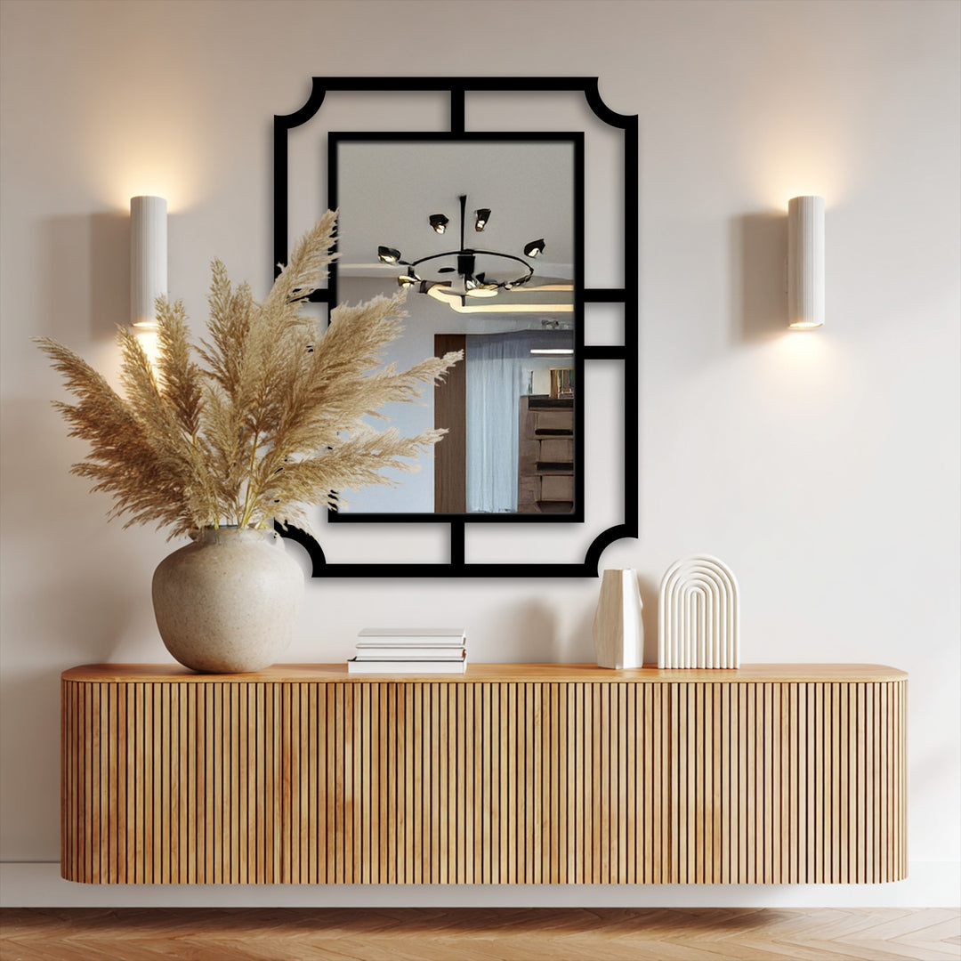 Visual rhythm is achieved with the geometric frame of this unique metal wall art mirror, reflecting a minimalist statement design.